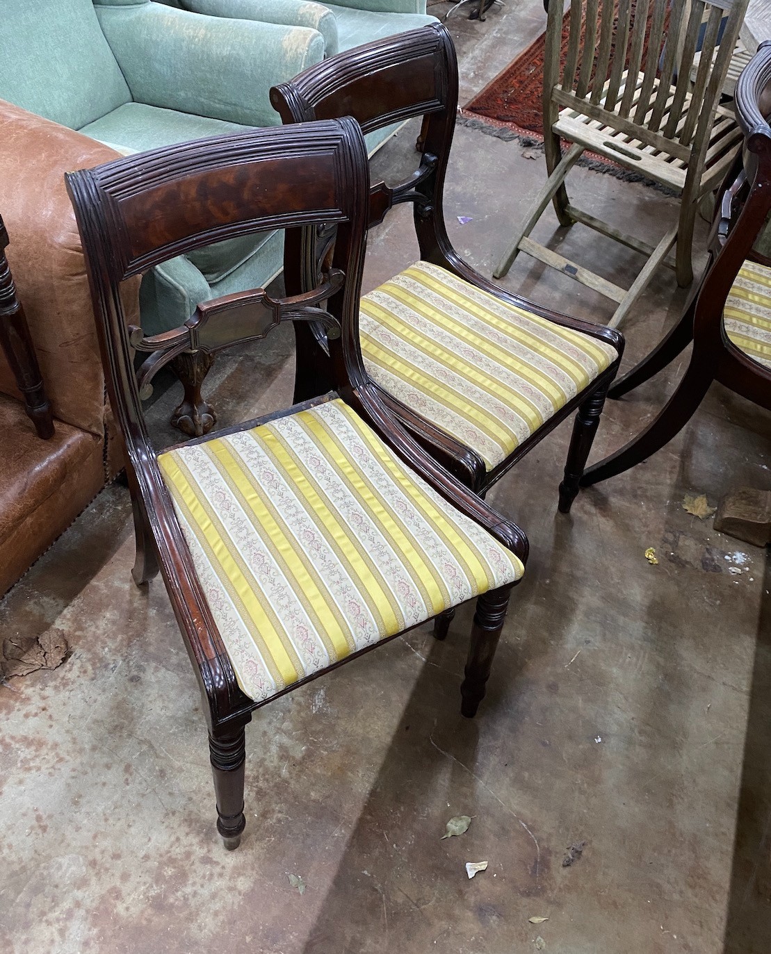 A set of ten Regency mahogany dining chairs, two with arms